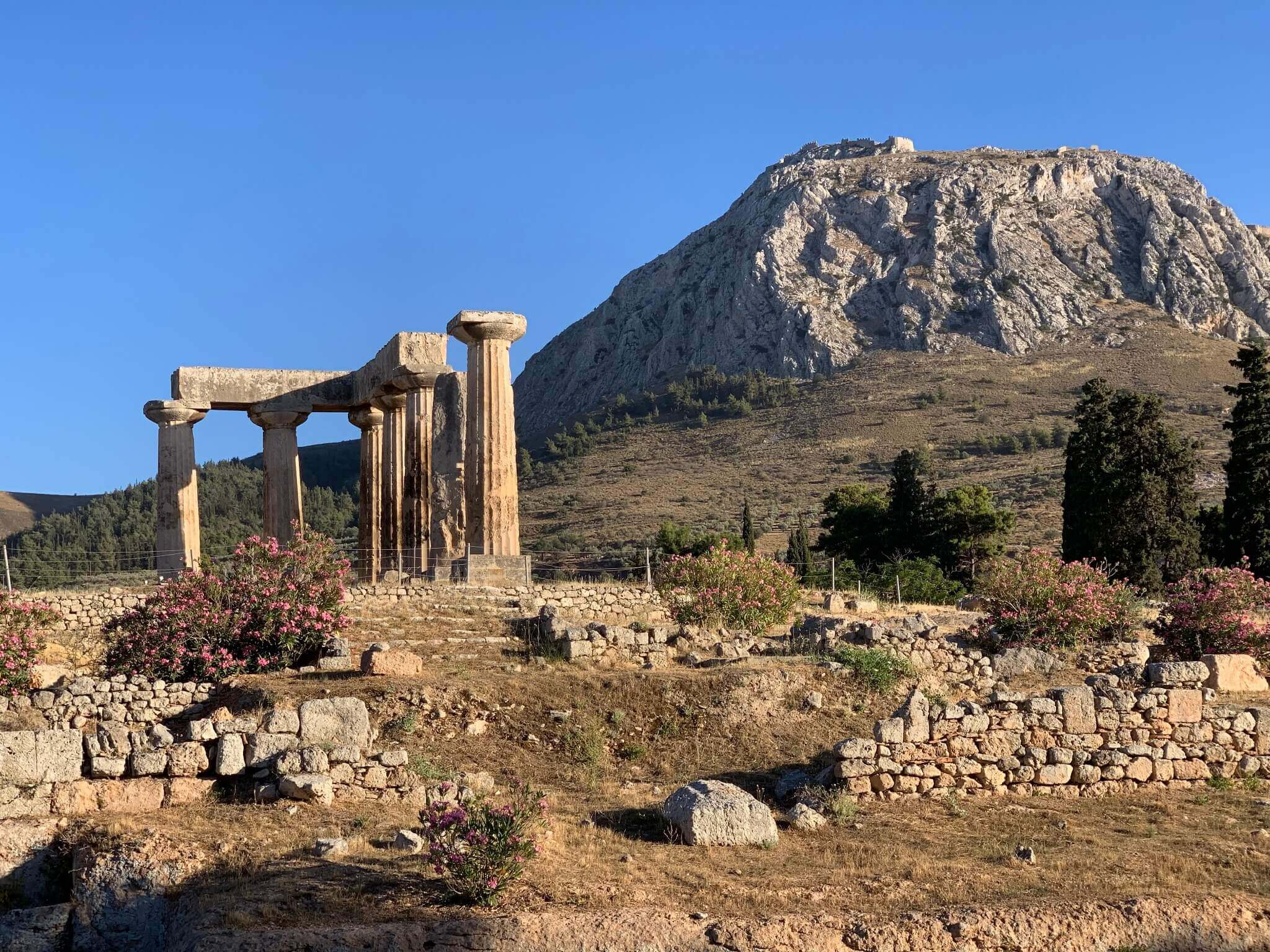 Ancient ruins in Greece with mountains beyond